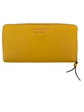 kate spade Yellow Saffiano Zip Wallet with Logo.